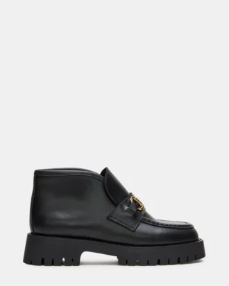 Leon de cuero negro Leon de cuero negro