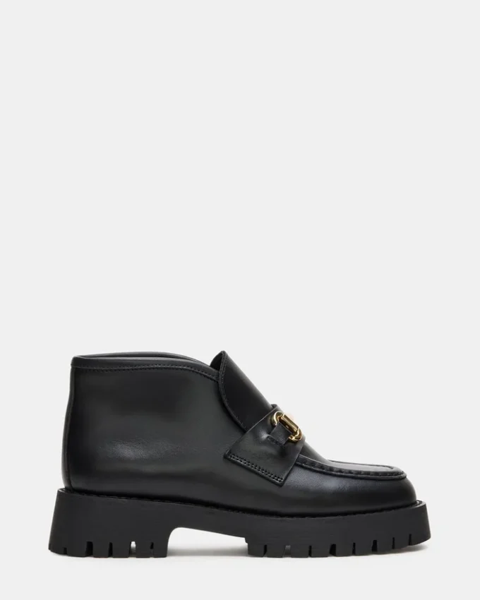 Leon de cuero negro Leon de cuero negro