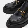 Leon de cuero negro Leon de cuero negro