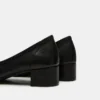 Mollie de cuero negro Mollie de cuero negro