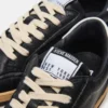 Prismo de cuero negro Prismo de cuero negro