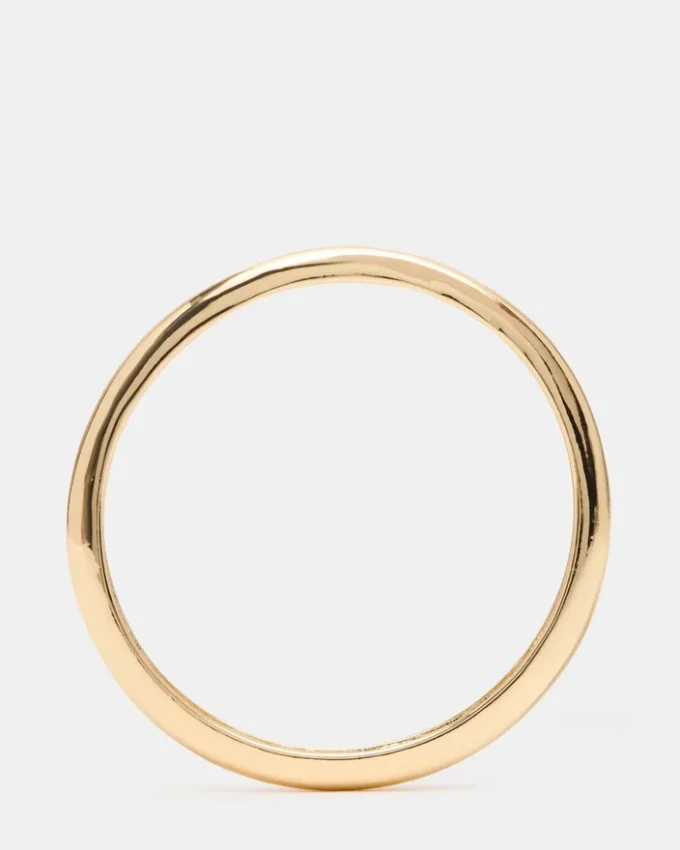 Pulsera tipo brazalete delgada dorada