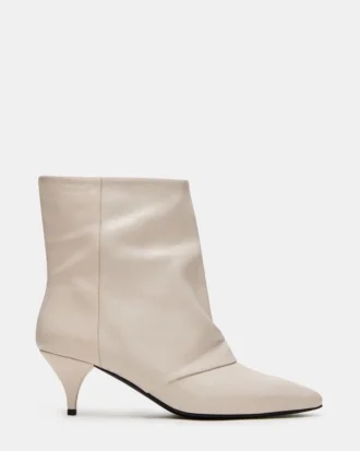 Shiner de cuero blanco