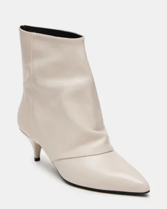 Shiner de cuero blanco