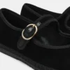 Velma de terciopelo negro