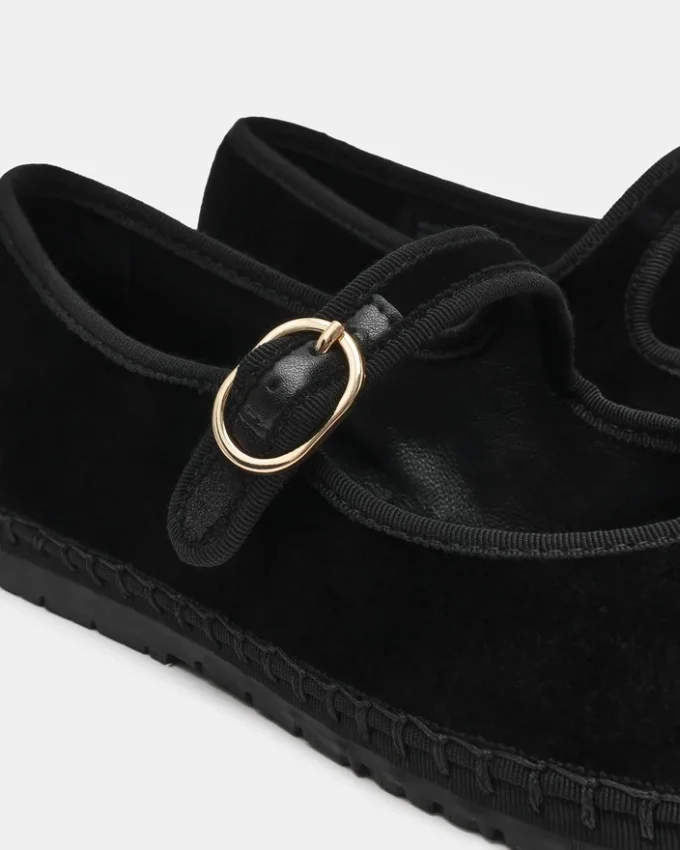 Velma de terciopelo negro