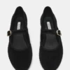 Velma de terciopelo negro