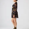 Vestido Bliss negro con estampado floral pequeño Vestido Bliss negro con estampado floral pequeño