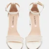 Zapatos de malla blancos Carrson para niños Zapatos de malla blancos Carrson para niños